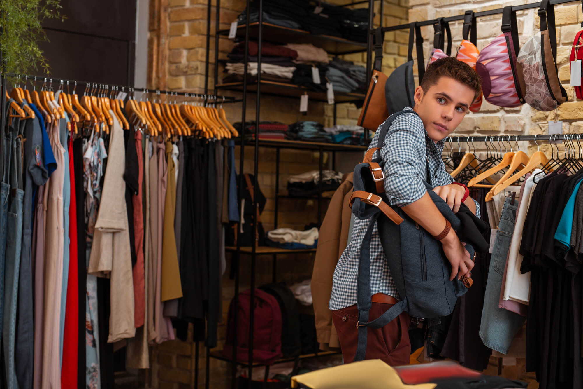 Young man shoplifting